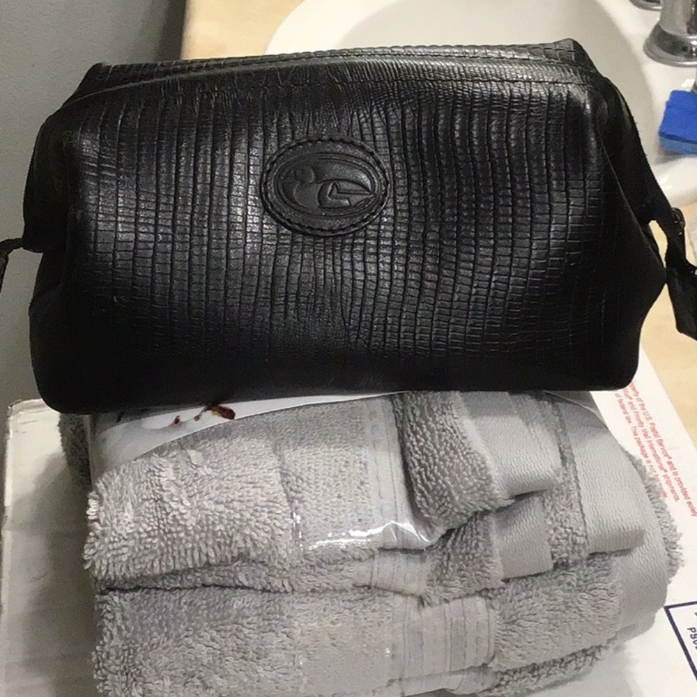 Used toiletrie bag, zipper closure.